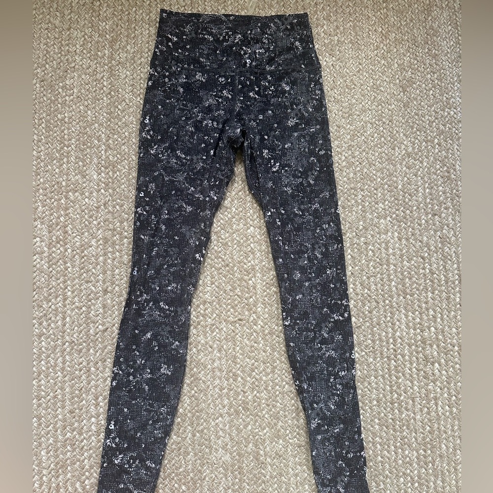 Lululemon Size 4 28” Align leggings black/pink pattern. Lightly worn.